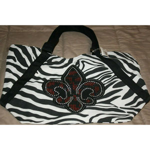 ZEBRA TOTE WITH STUDDED FLEUR-DE-LIS EMBLAM ON FRONT NEW BLACK/WHITE LADIES